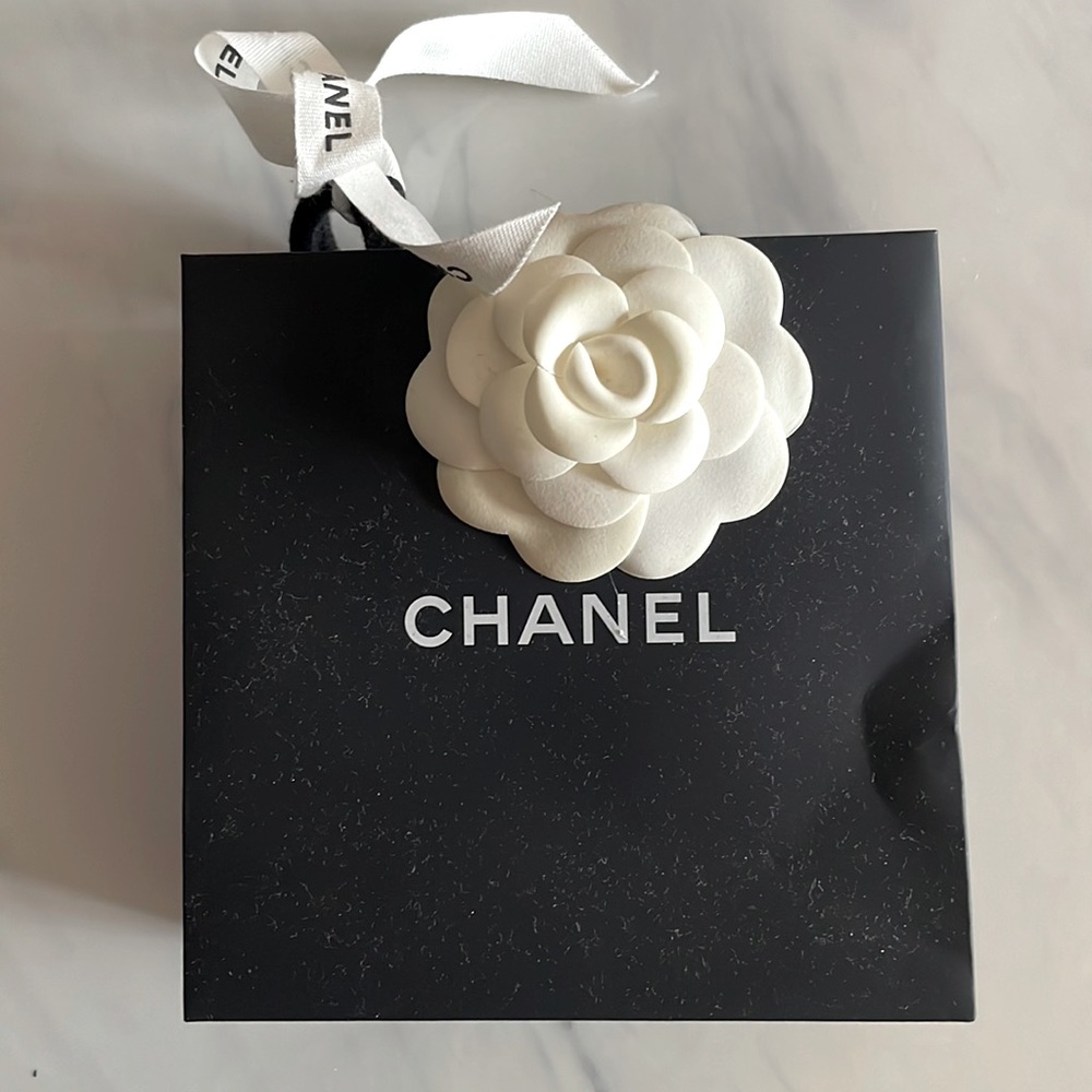 Authentic Chanel paper shopping mini bag.